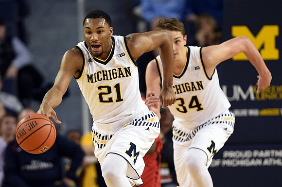 Zak Irvin (21) and Mark Donnal (34)