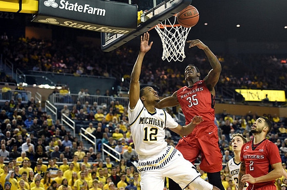 Muhammad-Ali Abdur-Rahkman (12) and Mark Donnal (34)