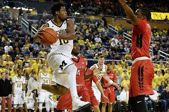 Derrick Walton Jr. (10) and Ricky Doyle (32)