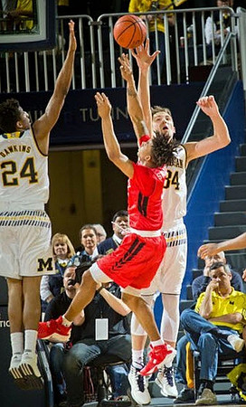 Aubrey Dawkins (24) and Mark Donnal (34)