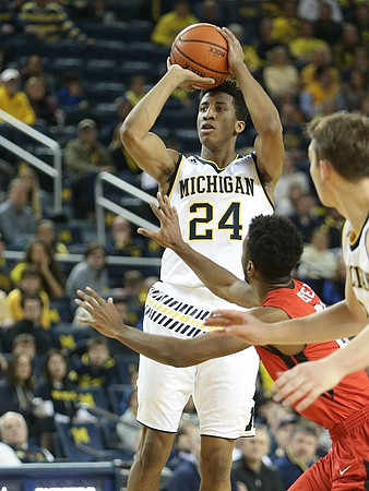 Aubrey Dawkins (24) and Mark Donnal (34)