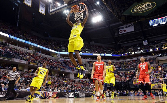Derrick Walton Jr. (10), Caris LeVert (23), and Glenn Robinson III (1)