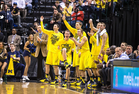 Nik Stauskas (11) and Jordan Morgan (52)