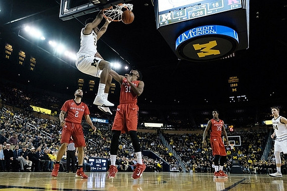 Aubrey Dawkins (24) and Mark Donnal (34)