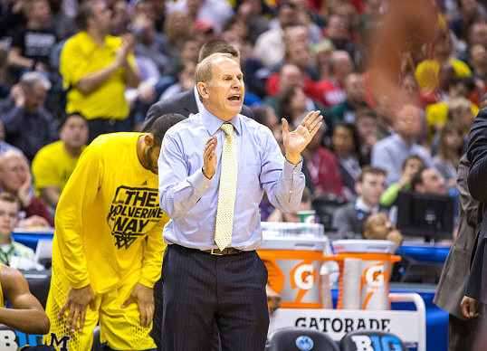 Glenn Robinson III (1) and Spike Albrecht (2)