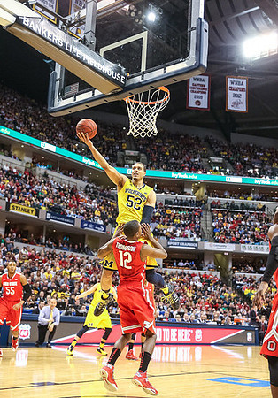 Mitch McGary (4), Glenn Robinson III (1), and Andrew Dakich (5)