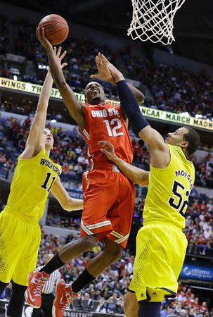 Nik Stauskas (11) and Jordan Morgan (52)