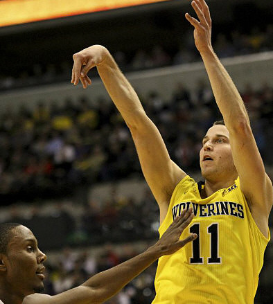 Glenn Robinson III (1), Nik Stauskas (11), and Caris LeVert (23)