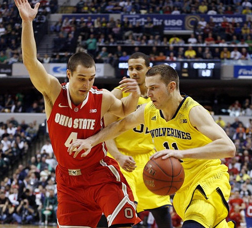 Nik Stauskas (11) and Jordan Morgan (52)