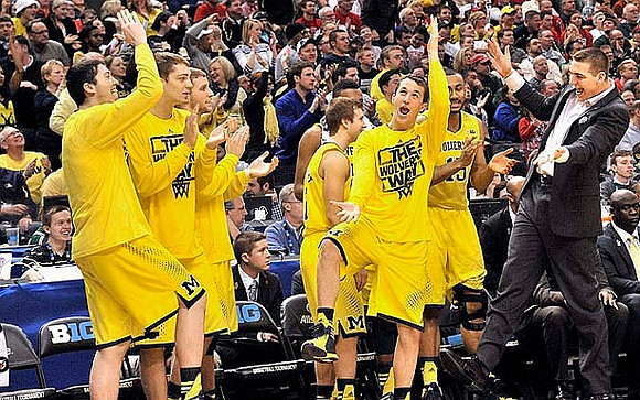 Nik Stauskas (11) and Glenn Robinson III (1)