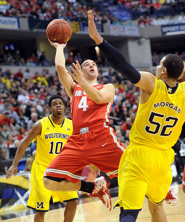 Derrick Walton Jr. (10) and Jordan Morgan (52)