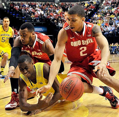 Spike Albrecht (2) and Caris LeVert (23)