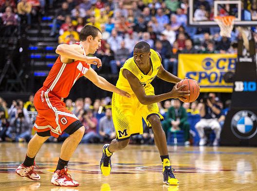 Jordan Morgan (52) and Nik Stauskas (11)