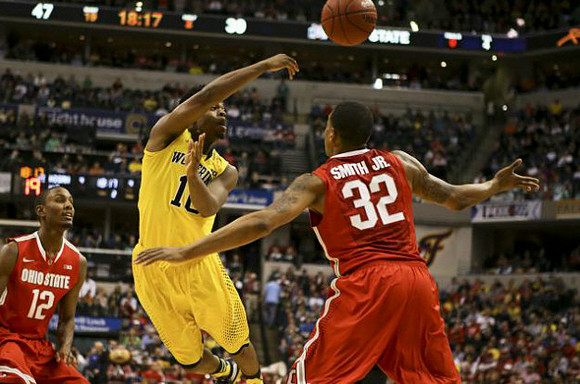Caris LeVert (23), Nik Stauskas (11), and Jon Horford (15)