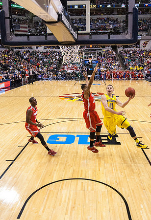 Glenn Robinson III (1) and Jordan Morgan (52)