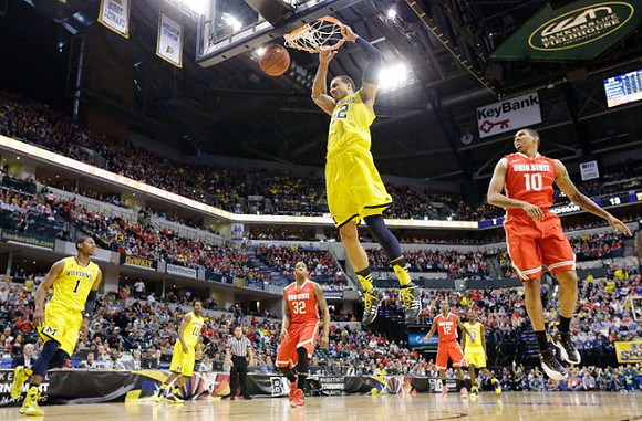 Glenn Robinson III (1), Derrick Walton Jr. (10), Jordan Morgan (52), and Caris LeVert (23)