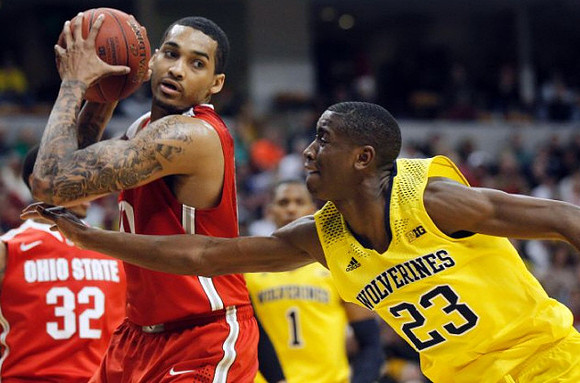 Glenn Robinson III (1) and Caris LeVert (23)