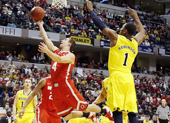 Nik Stauskas (11) and Glenn Robinson III (1)