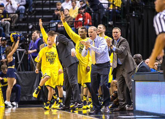Jon Horford (15), Caris LeVert (23), Nik Stauskas (11), and Spike Albrecht (2)