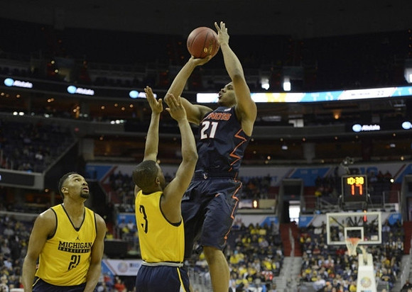 Zak Irvin (21) and Xavier Simpson (3)