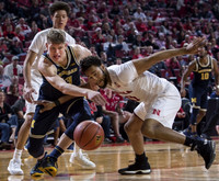 Moritz Wagner (13) and Derrick Walton Jr. (10)
