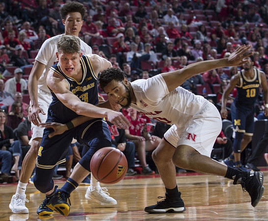 Moritz Wagner (13) and Derrick Walton Jr. (10)
