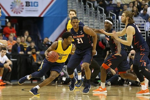 Derrick Walton Jr. (10) and Mark Donnal (34)