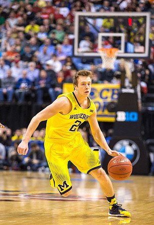 Caris LeVert (23) and Jordan Morgan (52)