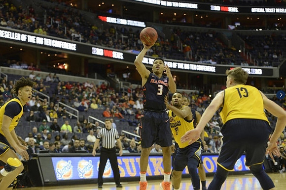 D.J. Wilson (5), Zak Irvin (21), and Moritz Wagner (13)