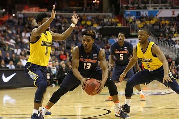 Derrick Walton Jr. (10) and Xavier Simpson (3)