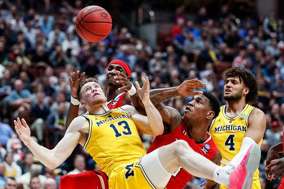 Ignas Brazdeikis (13) and Isaiah Livers (4)