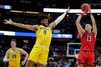 Jon Teske (15) and Isaiah Livers (4)