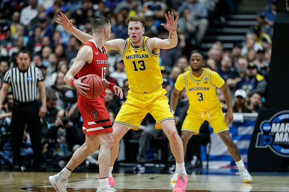 Ignas Brazdeikis (13) and Zavier Simpson (3)