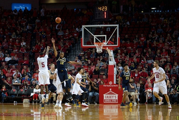 Muhammad-Ali Abdur-Rahkman (12), Xavier Simpson (3), and Ibi Watson (23)