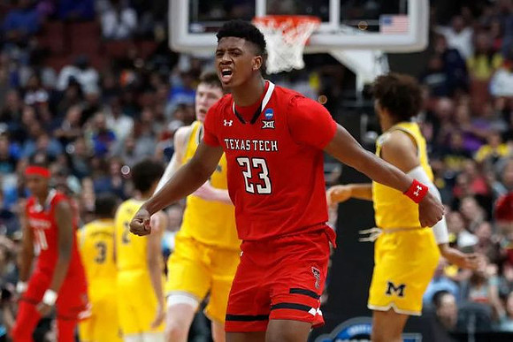 Zavier Simpson (3), Jordan Poole (2), Jon Teske (15), and Isaiah Livers (4)