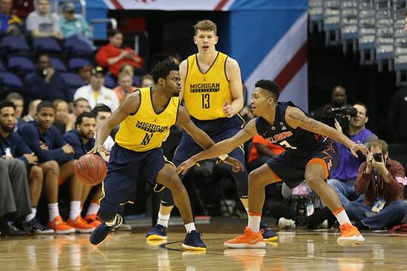 Derrick Walton Jr. (10) and Moritz Wagner (13)