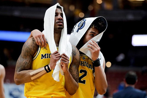 Charles Matthews (1) and Jordan Poole (2)