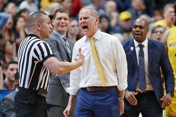 Luke Yaklich, John Beilein, and Deandre Haynes