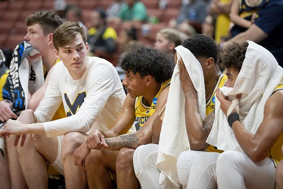 Jon Teske (15), Colin Castleton (11), Eli Brooks (55), Charles Matthews (1), and Jordan Poole (2)