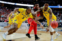 Zavier Simpson (3), Charles Matthews (1), and Eli Brooks (55)