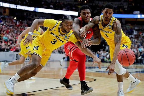 Zavier Simpson (3), Charles Matthews (1), and Eli Brooks (55)