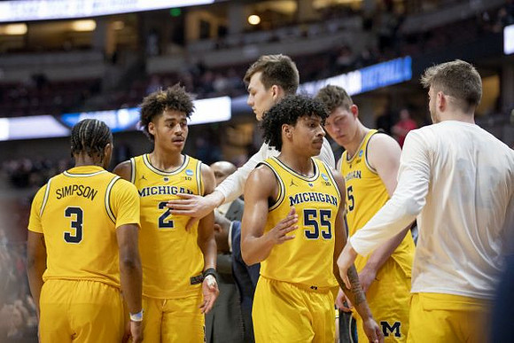 Zavier Simpson (3), Jordan Poole (2), Colin Castleton (11), Eli Brooks (55), Jon Teske (15), and Luke Wilson (32)