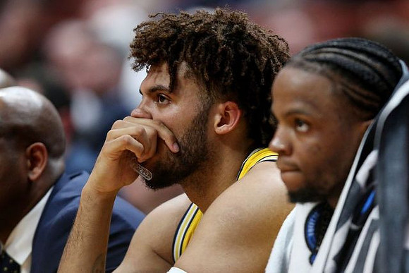 Isaiah Livers (4) and Zavier Simpson (3)