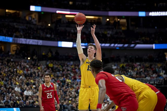 Jon Teske (15) and Charles Matthews (1)