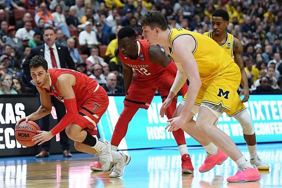 Jon Teske (15) and Charles Matthews (1)