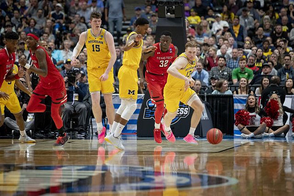 Zavier Simpson (3), Jon Teske (15), Charles Matthews (1), and Ignas Brazdeikis (13)