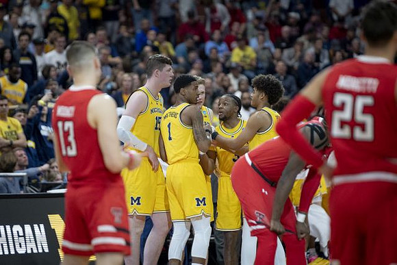 Jon Teske (15), Charles Matthews (1), Ignas Brazdeikis (13), Zavier Simpson (3), and Jordan Poole (2)
