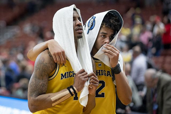 Charles Matthews (1) and Jordan Poole (2)
