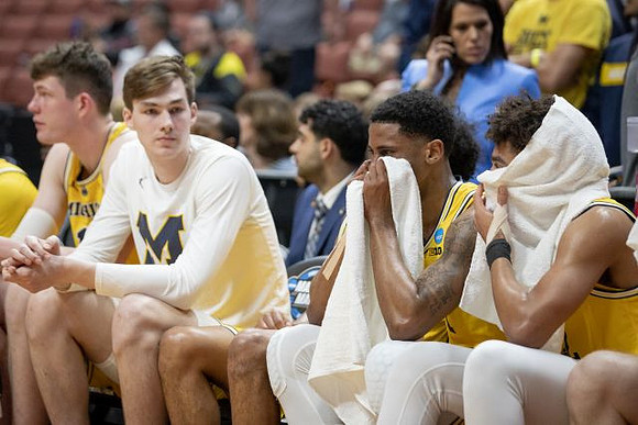 Jon Teske (15), Colin Castleton (11), Charles Matthews (1), and Jordan Poole (2)