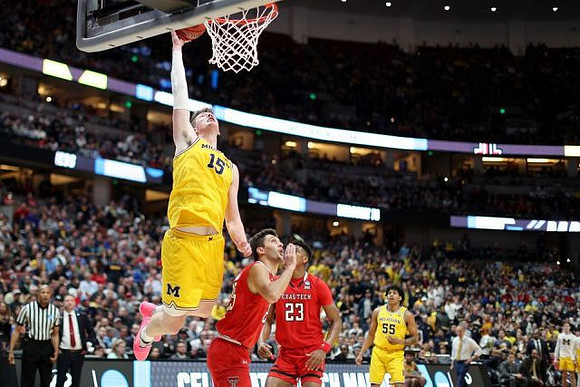 Jon Teske (15) and Eli Brooks (55)
